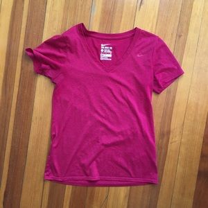 Bright pink Nike workout tee
